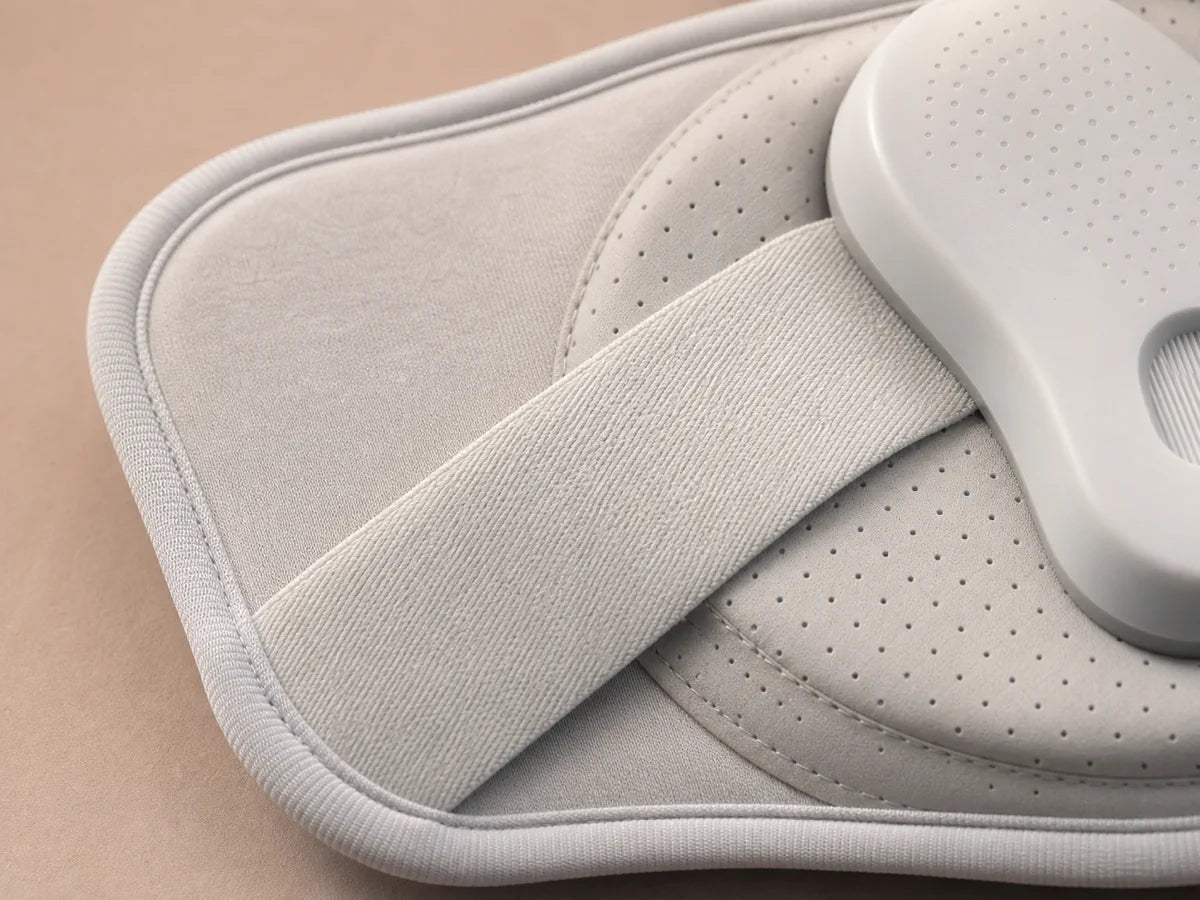 Close view of the soft textiles, stitching, and structured details of ESCOSY Lumbar One