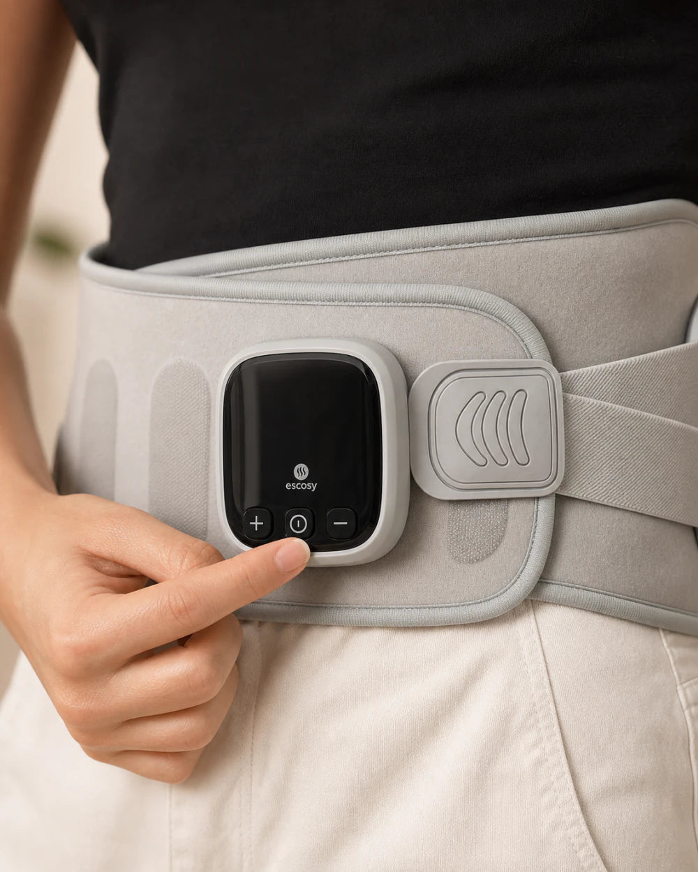 Close view of the ESCOSY Lumbar One LCD control panel fixed to the wrap